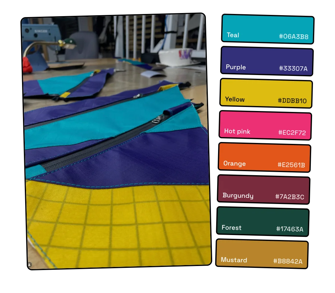 A photo of teal, purple and yellow fabric panels on the workshop table next to eight colour swatches from Steve’s fabric
